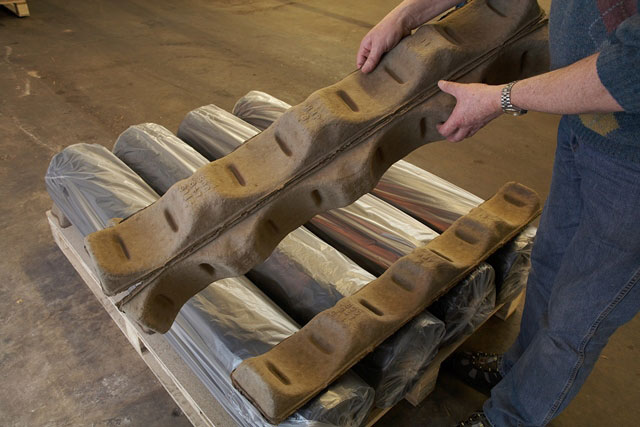 Place required number of Stakkers, or half Stakkers, flat side down on the pallet.